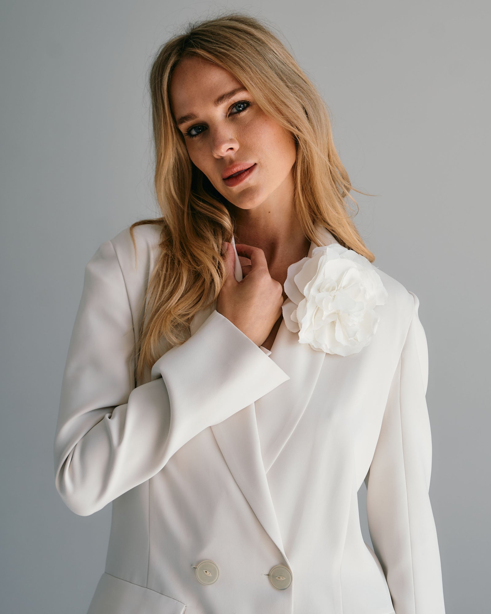 woman in white blazer